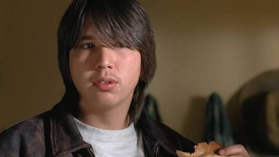 Young Dakota House in a television scene