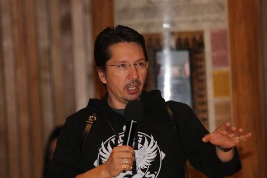 Dakota House speaking at an event